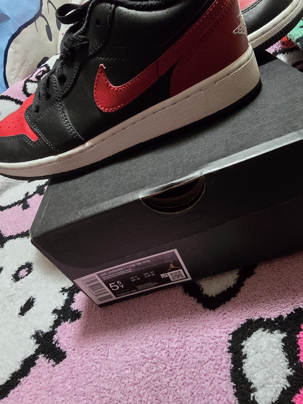 Nike Air Jordan 1 Low Black and Red Sneakers